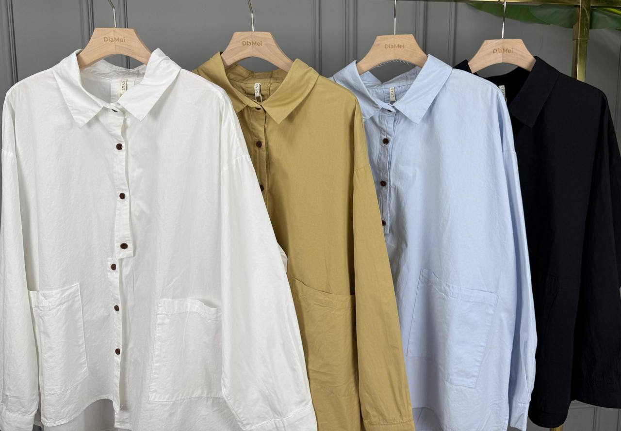 🌟 Стильные рубашки с пуговицами и практичными карманами спереди.